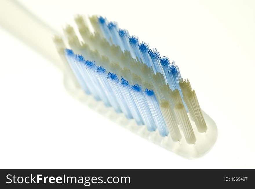 Closeup uf a toothbrush on white background