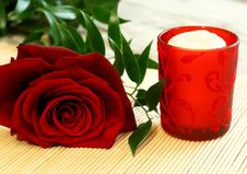 Red Rose And Red Candle Stock Images