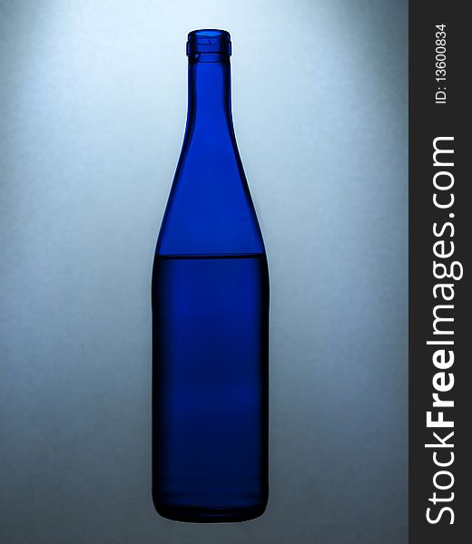 Blue bottle silhouette. Isolated objects.