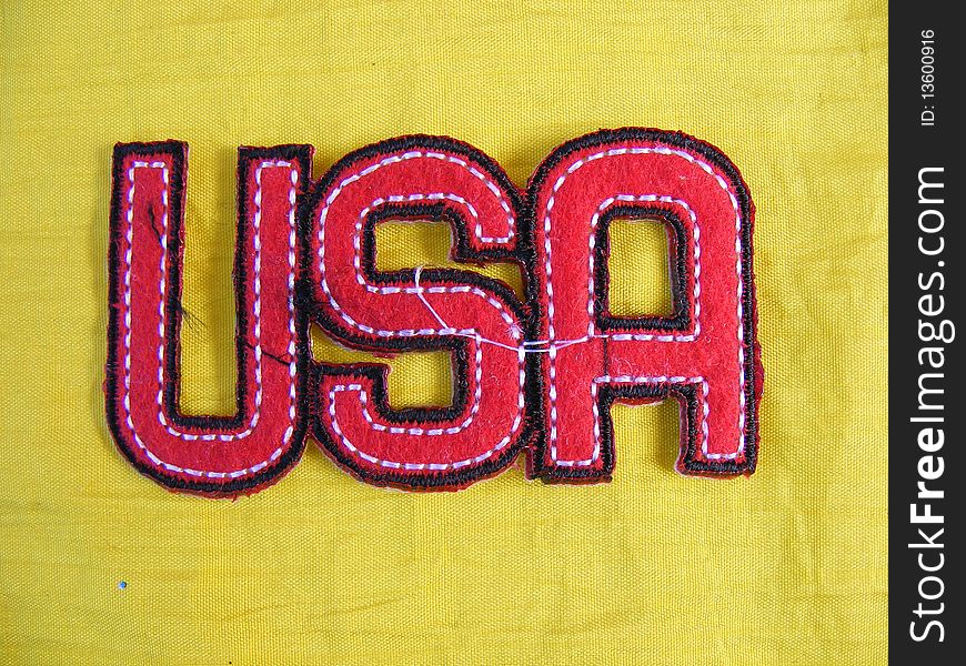 Marked in handmade cotton fabrics for clothing of various colors,banner United States of America. Marked in handmade cotton fabrics for clothing of various colors,banner United States of America
