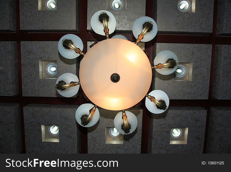 Isolated crystal chandelier in a chinese hotel.