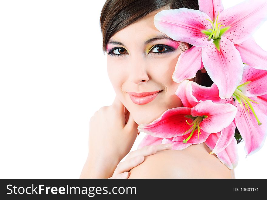 Shot of a young beautiful woman with a lily flowers. Isolated over white background. Shot of a young beautiful woman with a lily flowers. Isolated over white background.