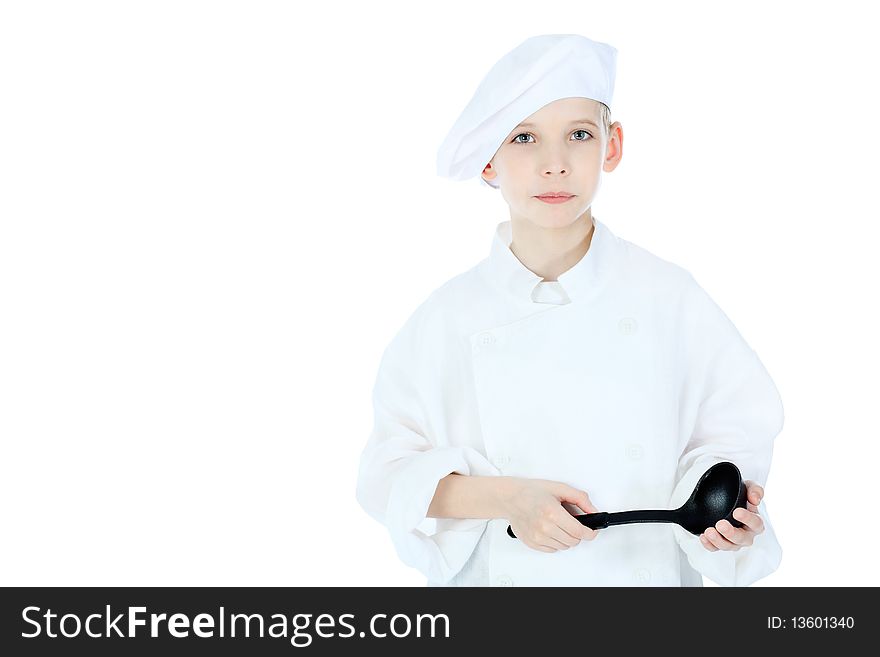 Shot of a little kitchen boy in a white uniform. Isolated over white background.
