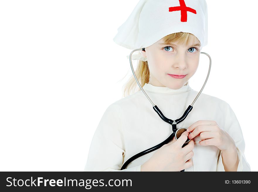 Shot of a little girl in a doctors uniform. Isolated over white background. Shot of a little girl in a doctors uniform. Isolated over white background.