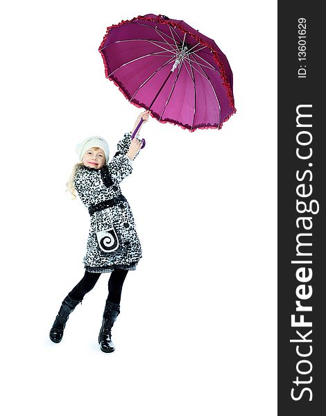 Portrait of a cute girl in a coat holding her umbrella. Isolated over white background.