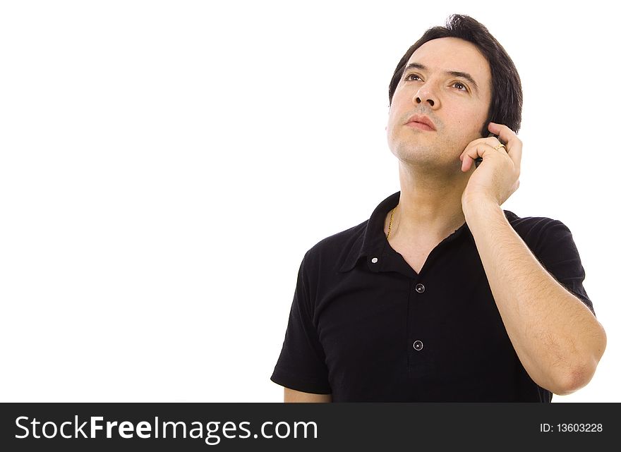 Young casual man using cellphone isolated on whithe. Young casual man using cellphone isolated on whithe