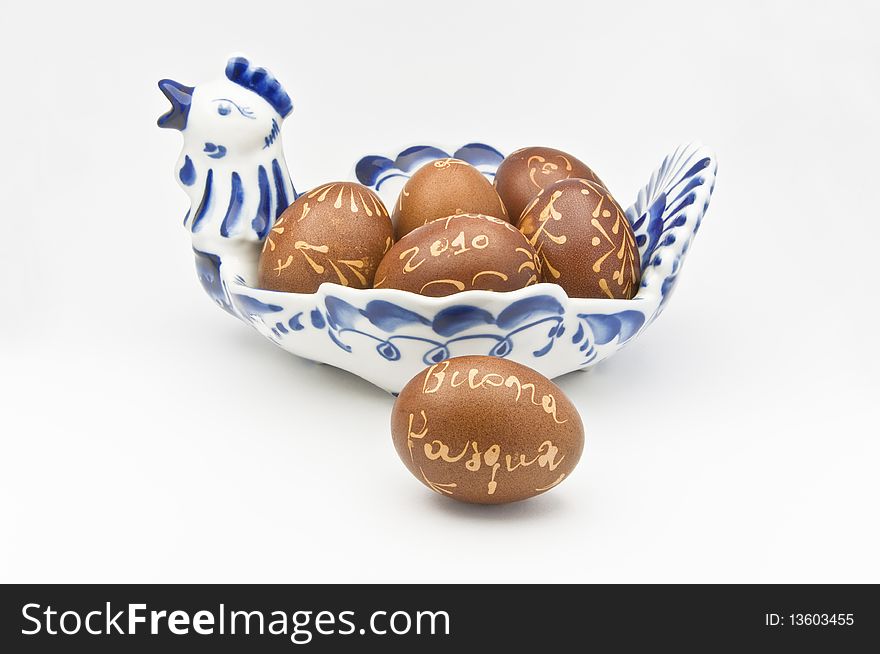 Easter greetings on decorated eggs in porcelain tray