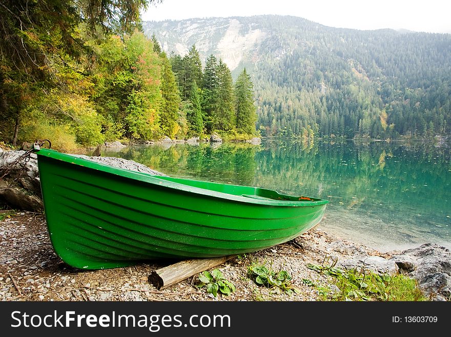 An image of a boat at beautiful lake