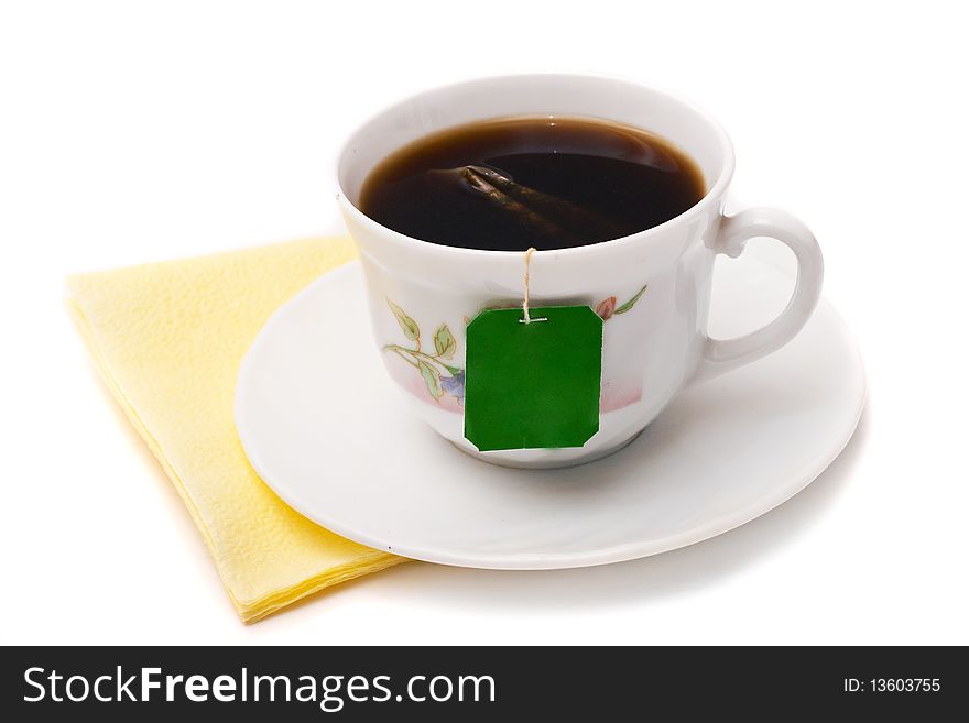 Cup of tea on the table and yellow cloth. Cup of tea on the table and yellow cloth.