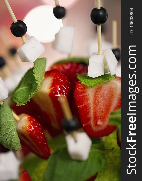 Fresh strawberries with peppermint and mozzarella cheese. Fresh strawberries with peppermint and mozzarella cheese