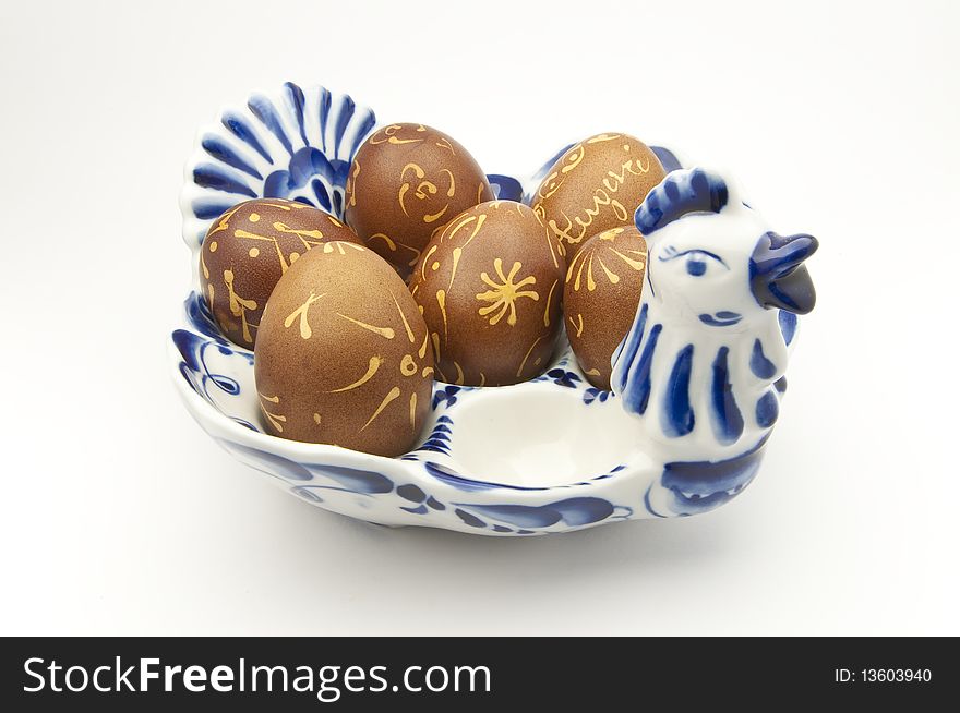 Easter greetings on decorated eggs in porcelain tray