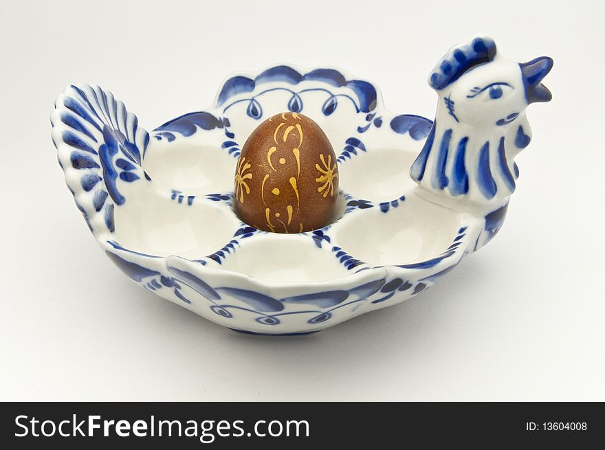 Easter greetings on decorated eggs in porcelain tray