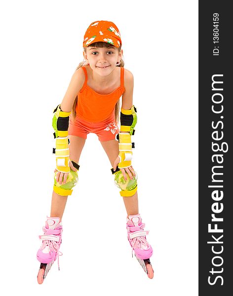 The girl in an orange suit on pink roller skates. The girl in an orange suit on pink roller skates