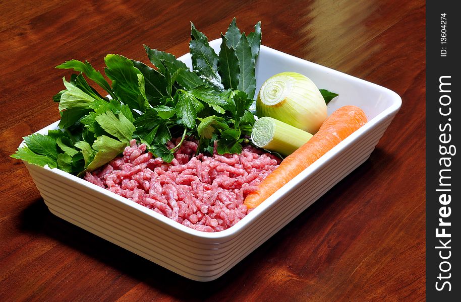 Raw minced beef with carrots, parsley and onion