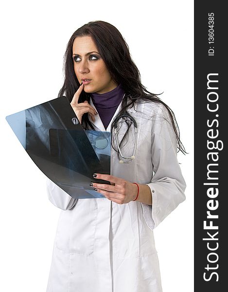 Cute female doctor holding xray scans. Cute female doctor holding xray scans