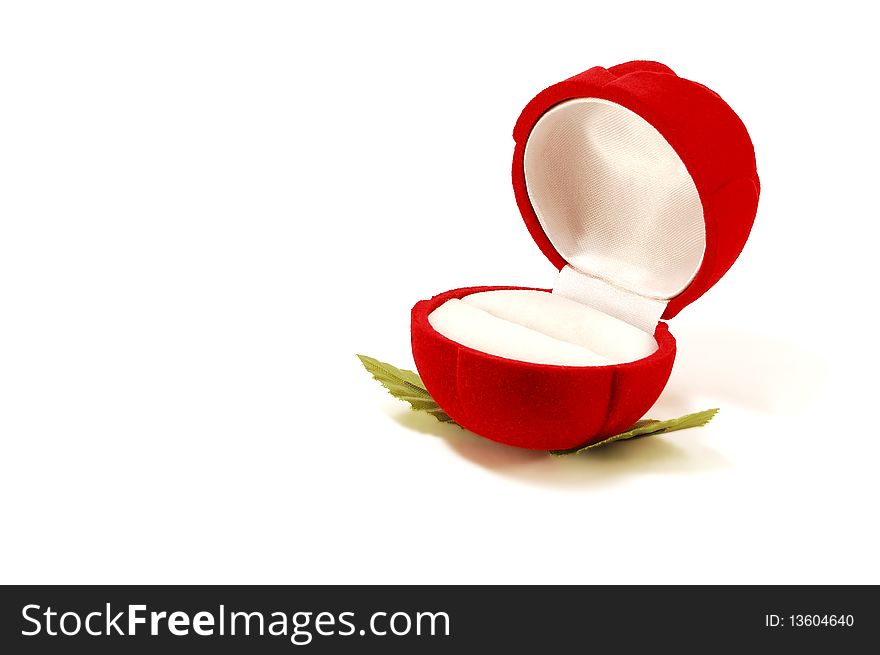 The red box for jewelry in the form of a rose, isolated on a white background. The red box for jewelry in the form of a rose, isolated on a white background