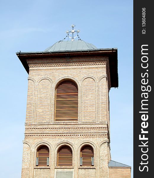 Bell tower on blue sky