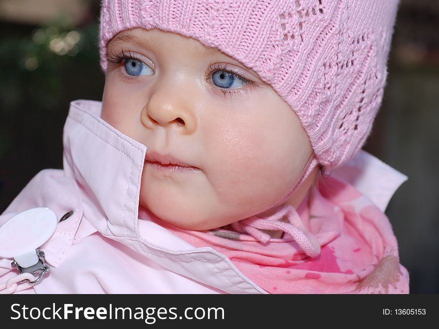 Outdoor portrait of a girl with blue eyes. Outdoor portrait of a girl with blue eyes.