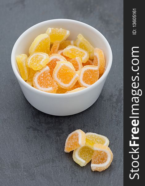 Fruit candy sweets in a white bowl