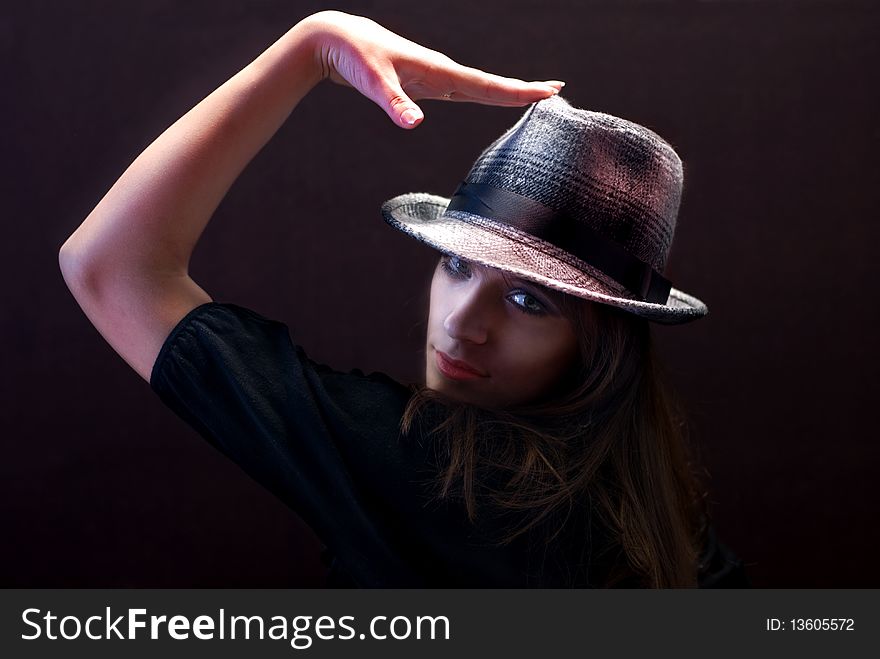 Portrait of a young sensual fashion woman at hat. Portrait of a young sensual fashion woman at hat