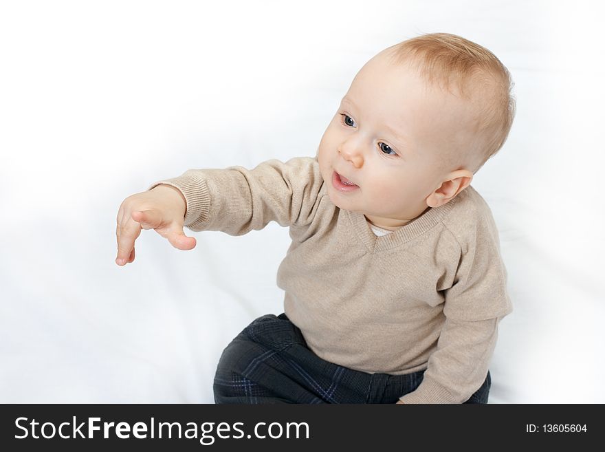 The portait of little baby boy on white. The portait of little baby boy on white