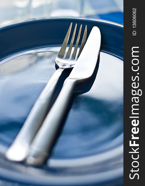 Stack of blue dishware and tableware