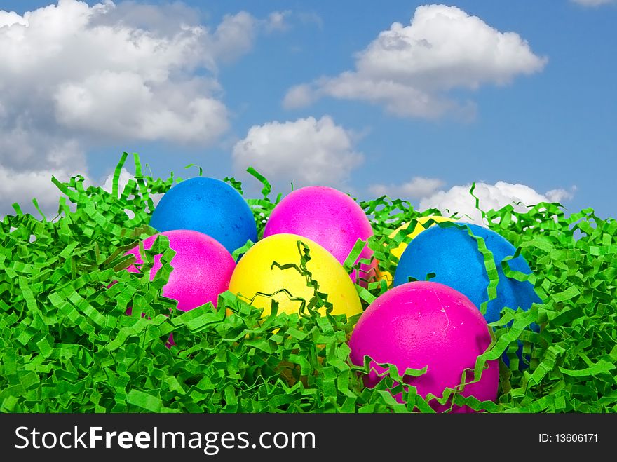 Colorful Easter eggs in fake grass. Colorful Easter eggs in fake grass.