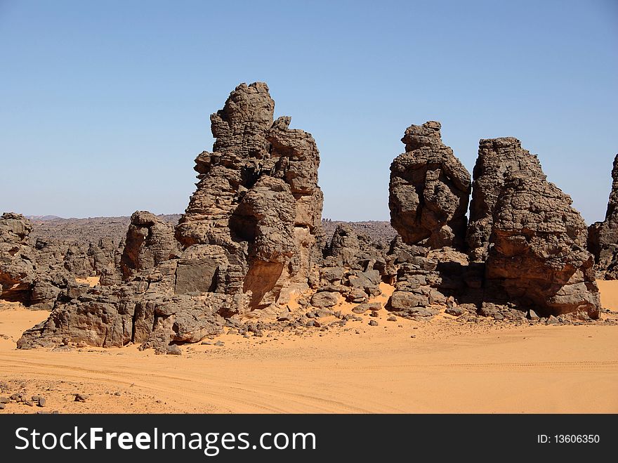 Sandstone peaks in the desert of Libya, in Africa. Sandstone peaks in the desert of Libya, in Africa