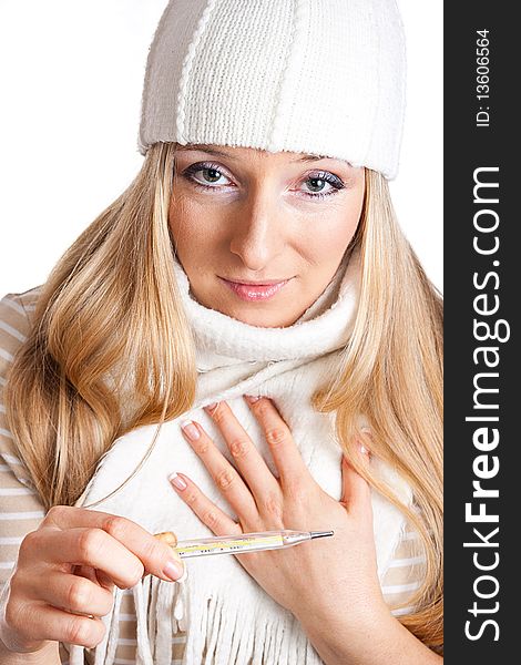 Woman holding thermometer, with hand on her head, worried and sick. Woman holding thermometer, with hand on her head, worried and sick