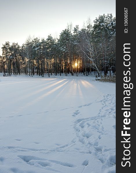 Winter scene over a frozen lake in winter