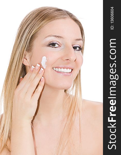 Woman Creaming Face