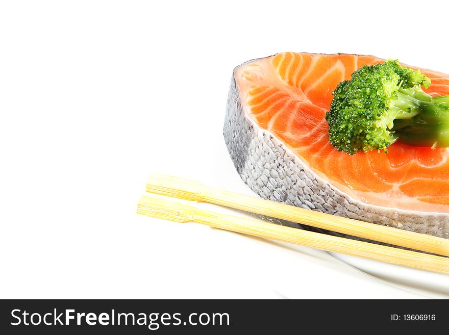Salmon Slices with Broccoli isolated on white background