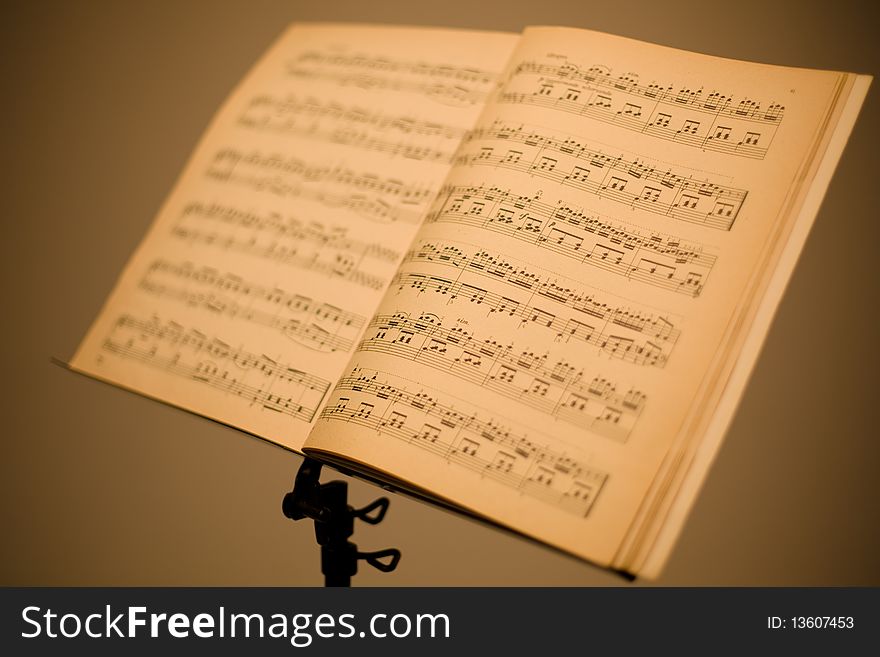 Music stand with piano notes