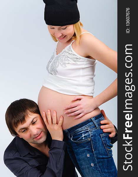 Portrait happy young couple in studio