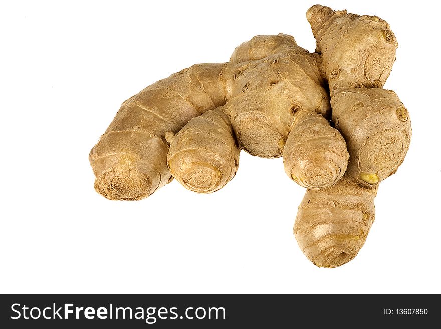 Raw whole ginger root closeup isolated on white background. Raw whole ginger root closeup isolated on white background