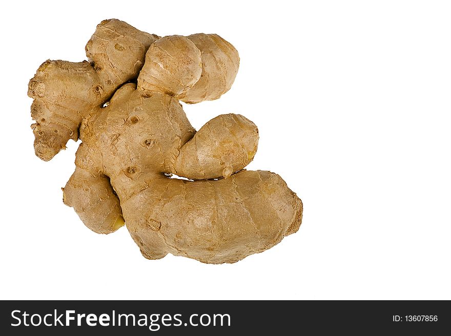 Whole raw ginger root closeup isolated on white background