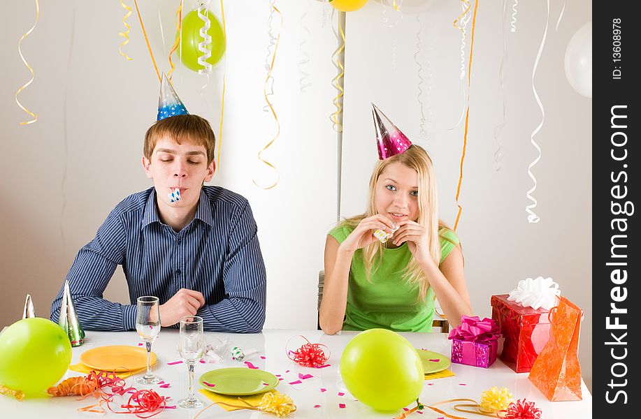 Young happy smiling couples at birthday. Young happy smiling couples at birthday