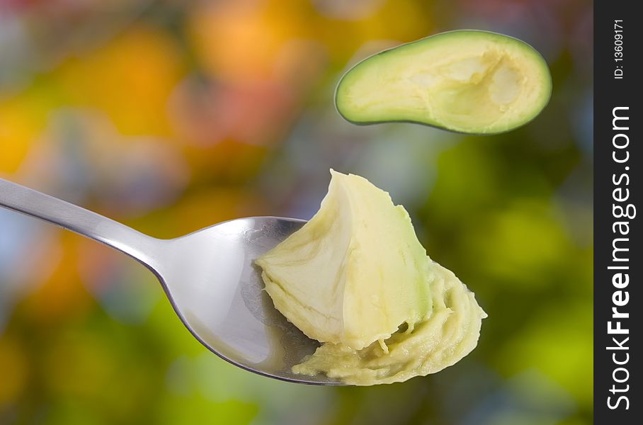 Healthy avocado in the spoon. Healthy avocado in the spoon.