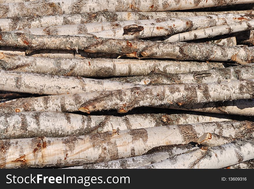 Stack of birch logs background