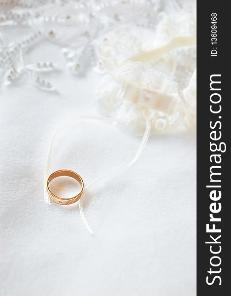 Wedding ring on satin and lace. Wedding ring on satin and lace