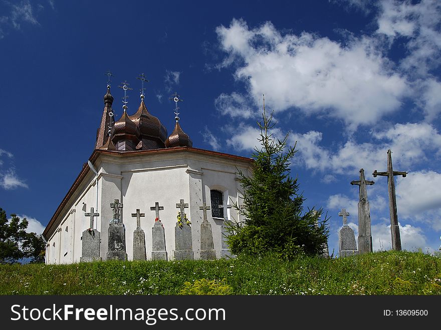 Orthodox church with crosses on the hill relating to the blue sky. Orthodox church with crosses on the hill relating to the blue sky