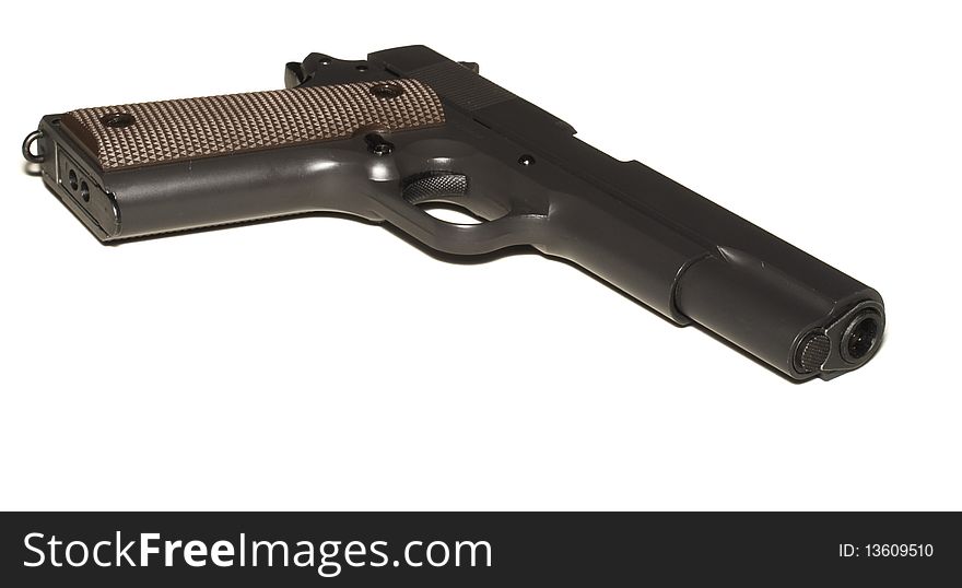 Caliber pistol isolated over white