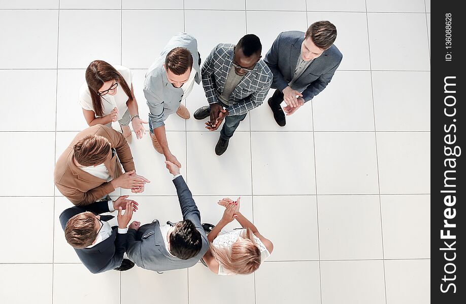 Top View. Meeting Business Partners In The Office