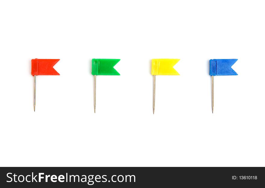 Four color pins isolated on white background