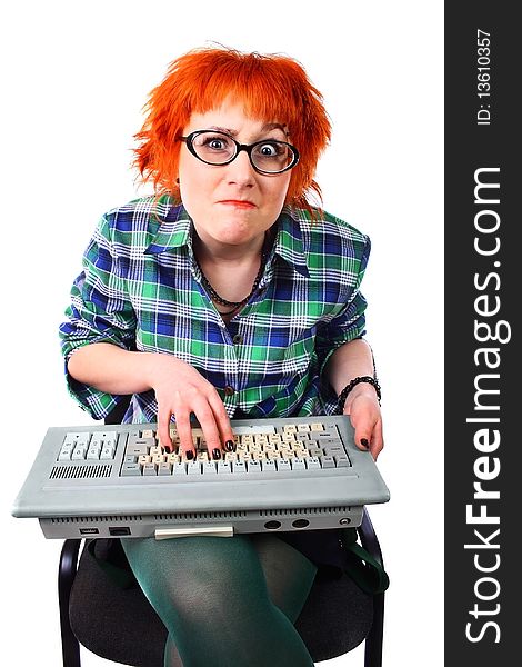 Girl with an old keyboard on a white background