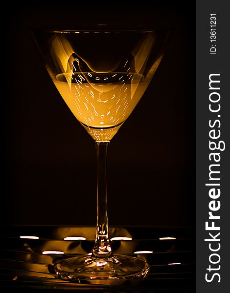 Yellow cocktailglas with interessting light