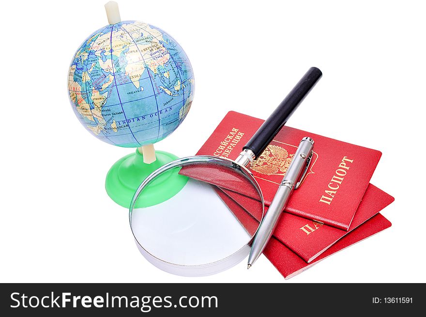 Three passports,  globe and magnifier on white background. Three passports,  globe and magnifier on white background