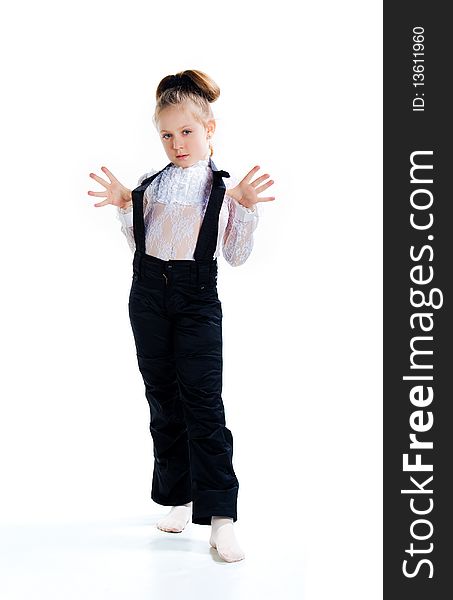 Beautiful little girl in black overall. Isolated on a white background overall