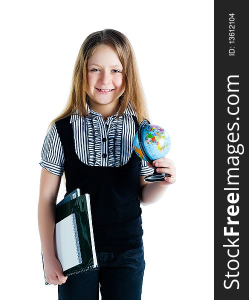 Cute schoolchild with terrestrial globe and notebooks on white