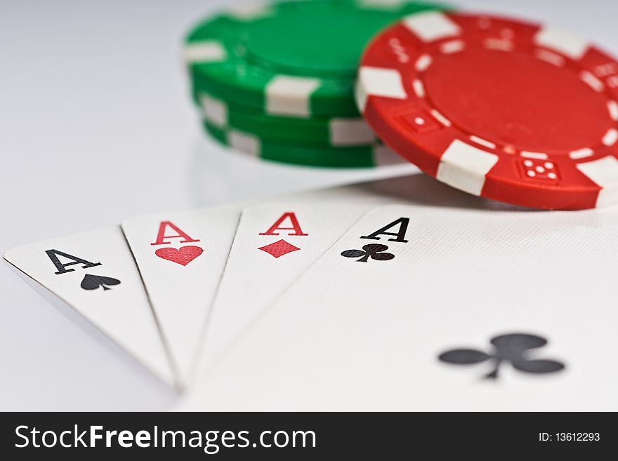 Poker cards, four aces with green and red chips. Poker cards, four aces with green and red chips